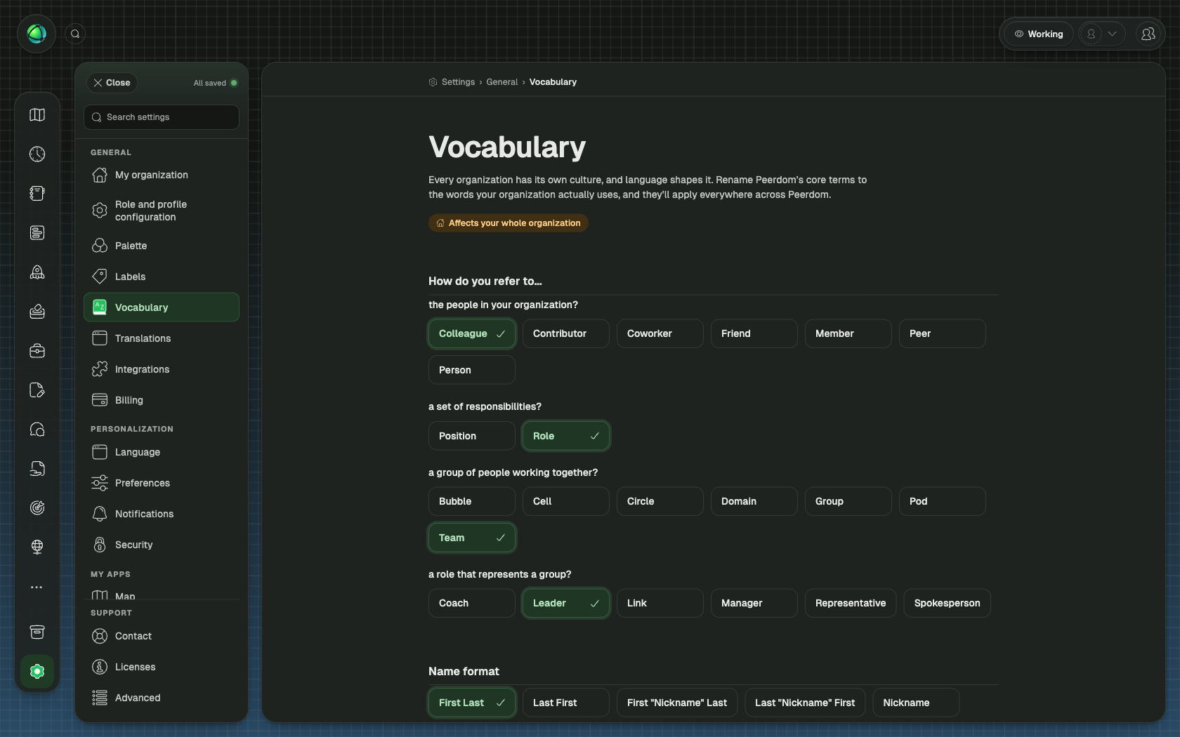 Each term has a dropdown with several alternatives. Changes apply across the entire Peerdom interface.